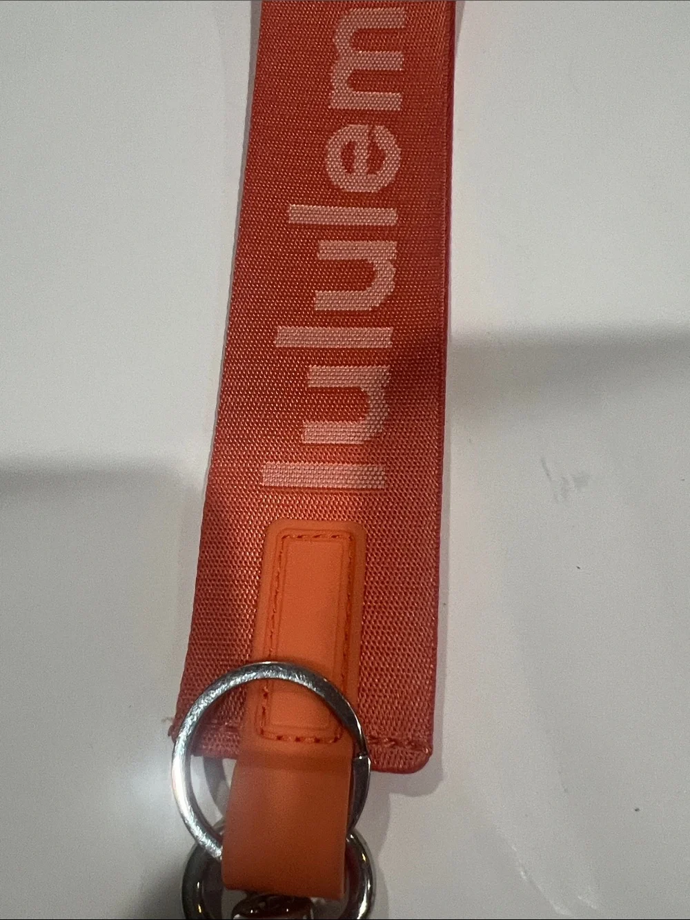 lululemon athletica Coral Orange Wrist Lanyard with Metal Clip